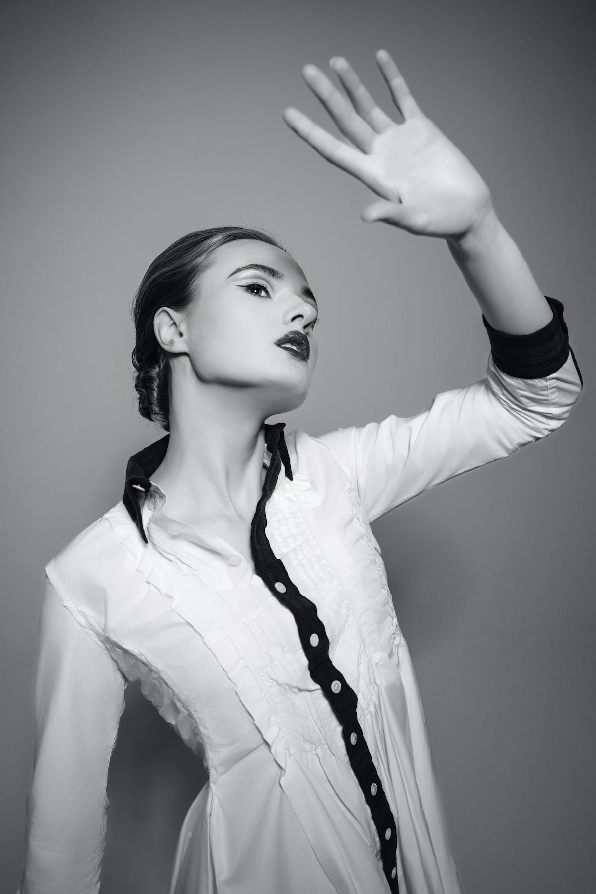 High-fashion monochrome portrait.