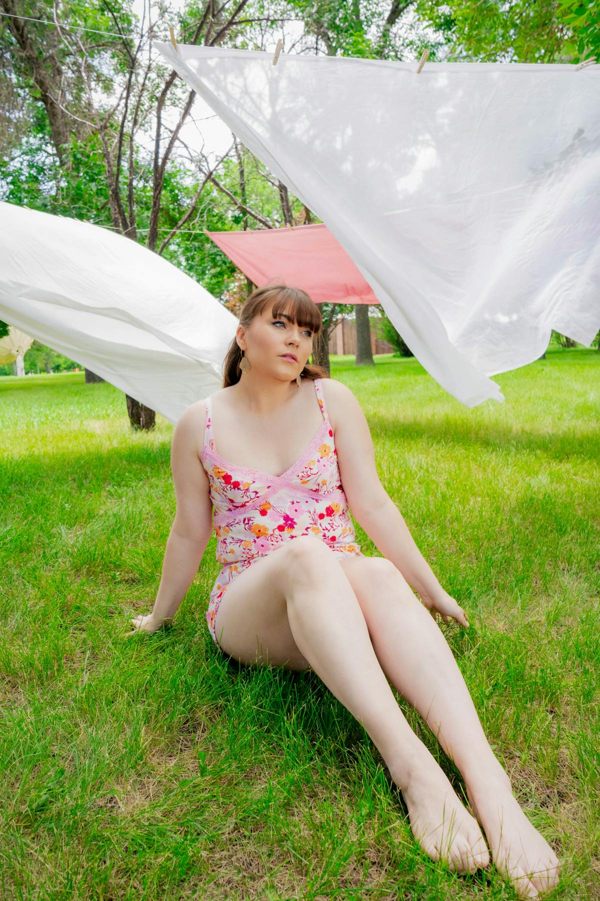 Summer fashion scene near hanging laundry.